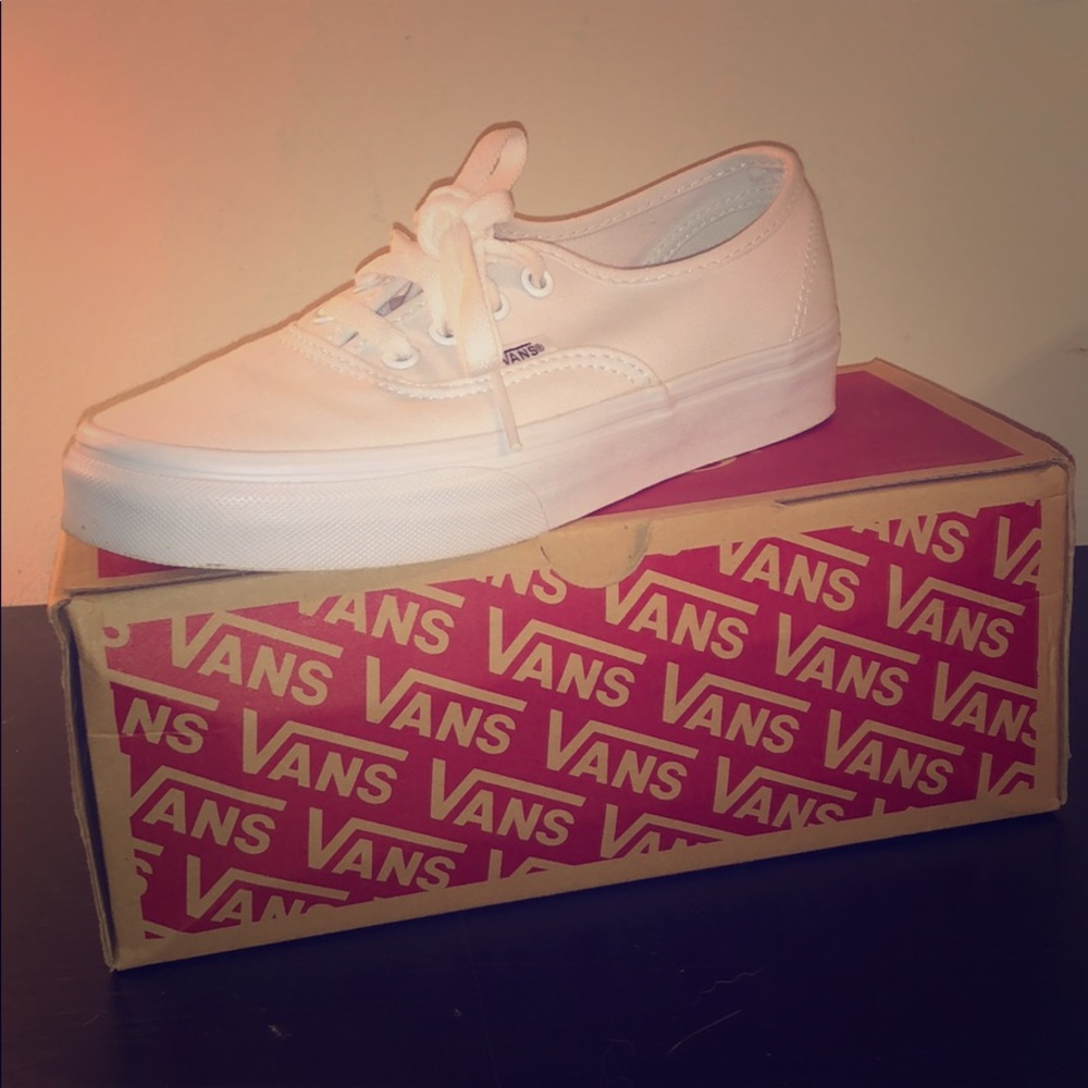 White, lace up vans. ONLY WORN ONCE.